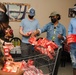 Holiday Food Basket Packing at the Hickam Commissary