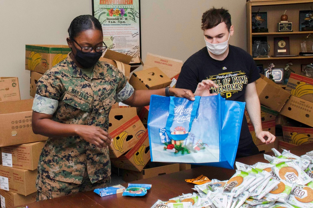 Holiday Food Basket Packing at the Hickam Commissary