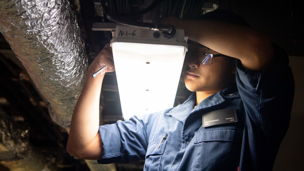 Sailors assigned to Mine Division Twelve Conduct Maintenance Aboard USS Charleston