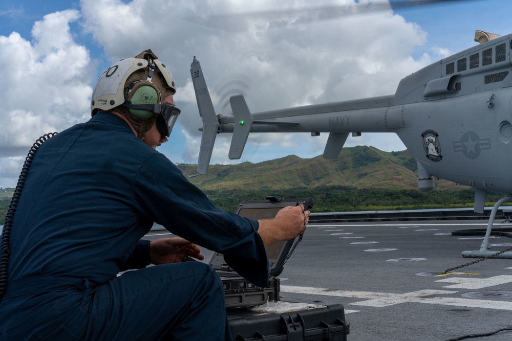 HSC 23 Sailor Performs Ground Turns on MQ-8C Fire Scout