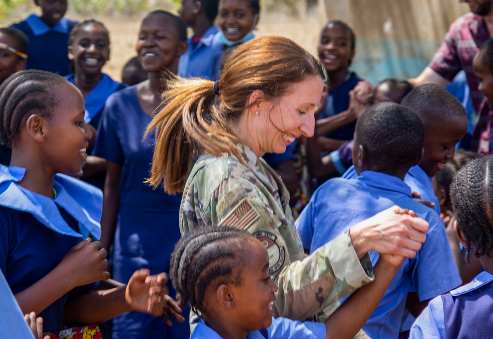 U.S. service members engage with Kenyan school