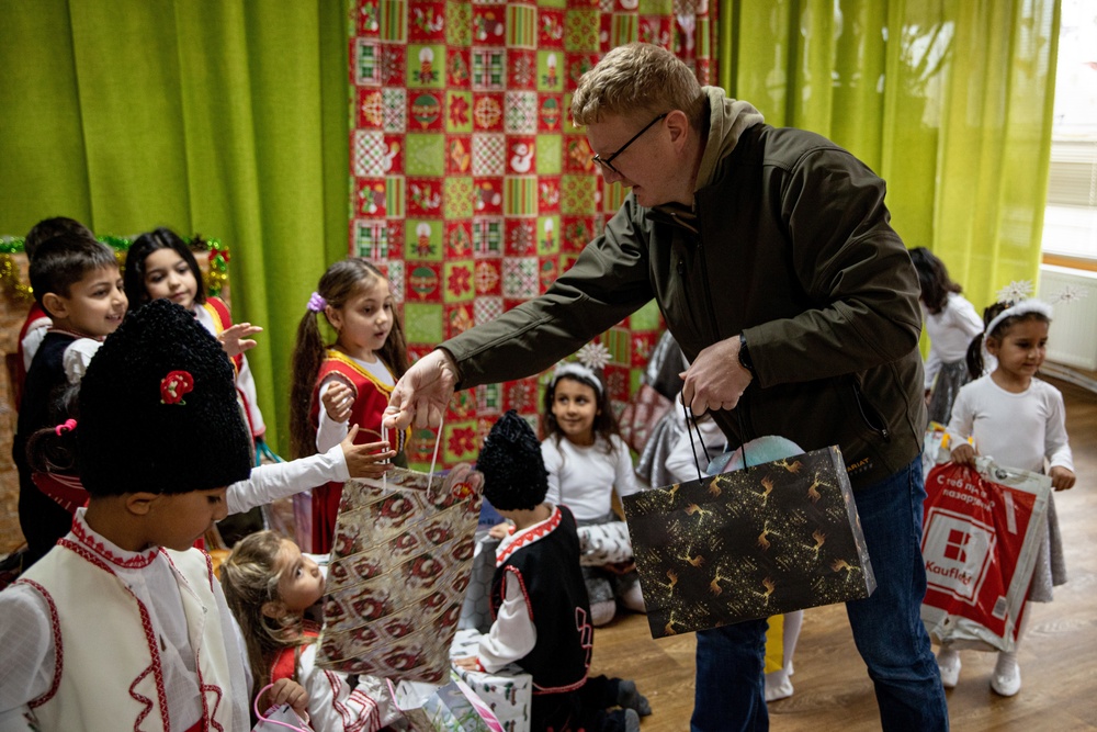 Supporting Santa: Novo Selo Training Area Personnel gift local schools