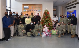 NAVSUP FLC Norfolk Makes Holidays Brighter for Families at Adopted School With Gift Drive