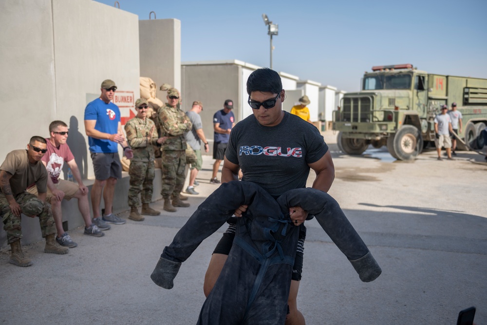 332nd AEW firefighters run obstacle course