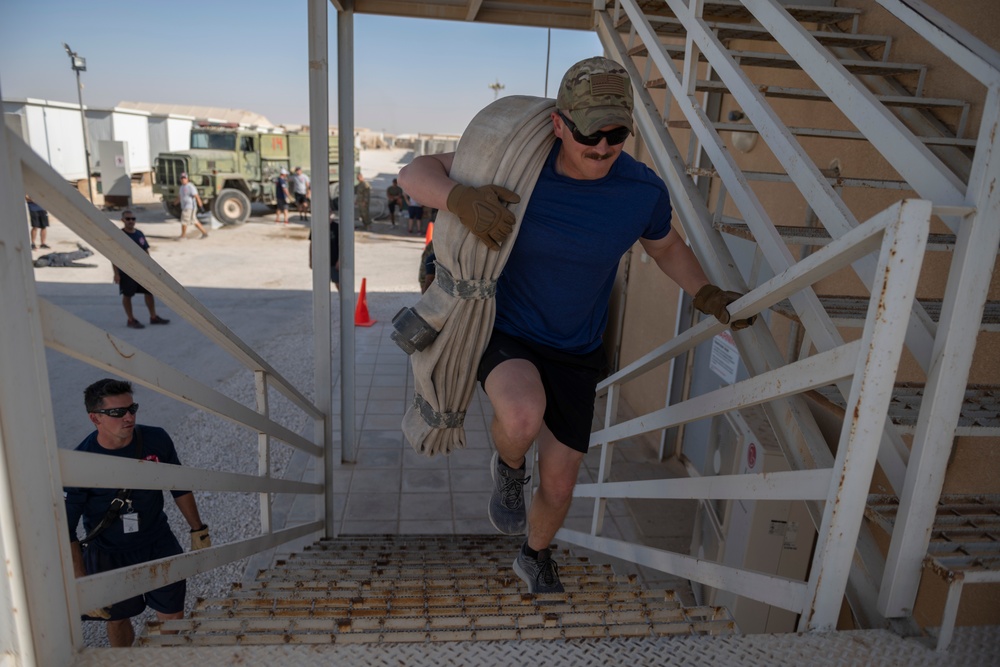 332nd AEW firefighters run obstacle course