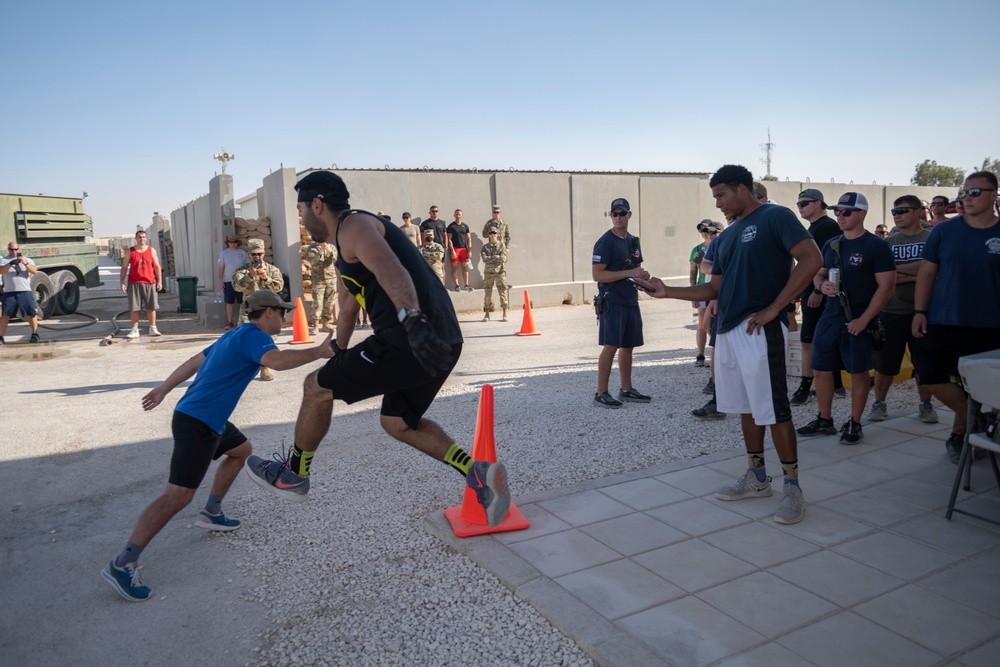 332nd AEW firefighters run obstacle course