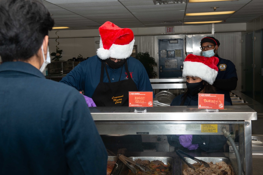 USS John C. Stennis Sailors enjoy a holiday meal