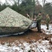 Marines practice building Arctic tent as part of CWOC Class 22-01 training