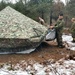 Marines practice building Arctic tent as part of CWOC Class 22-01 training