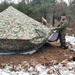 Marines practice building Arctic tent as part of CWOC Class 22-01 training