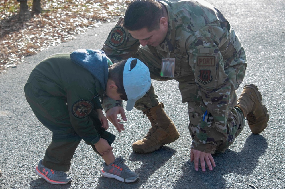 Task Force Liberty Airman helps Afghan child