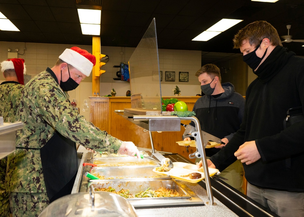 NSGL Leadership Serves Christmas Dinner at Galley