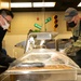 NSGL Leadership Serves Christmas Dinner at Galley