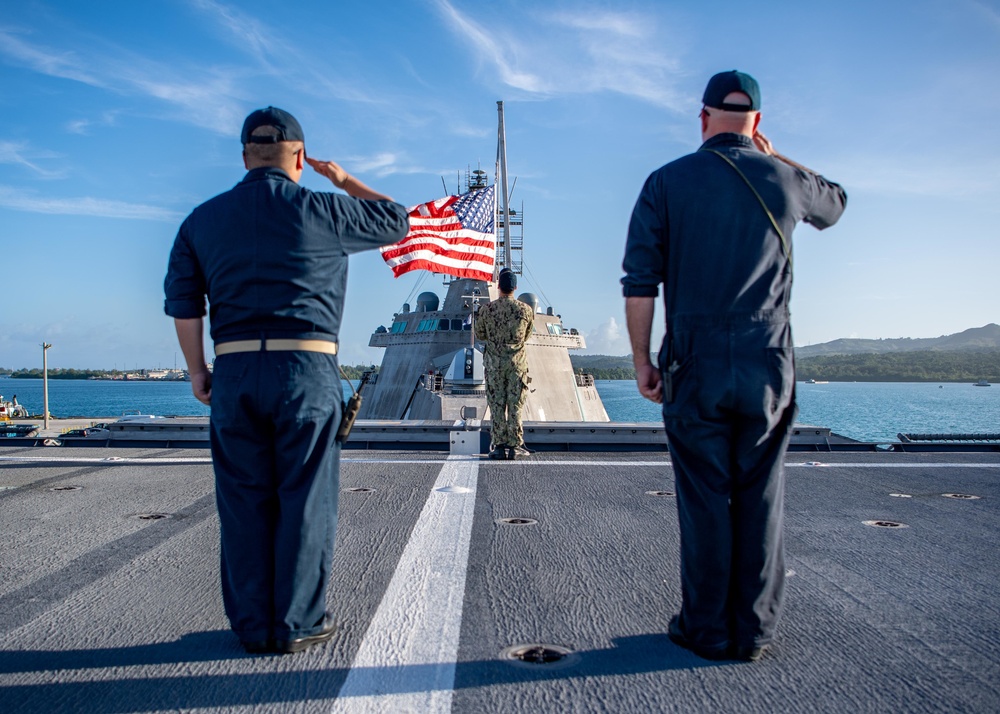 USS Charleston Sailors Observe Morning Colors