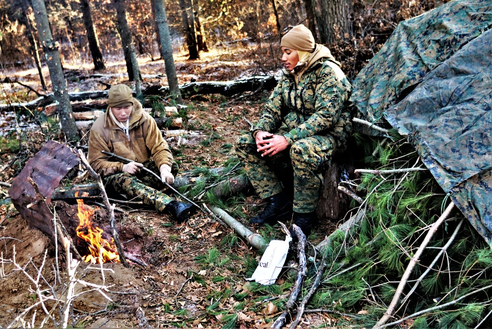 Improvised shelter building among important skills taught to Cold-Weather Operations Course Class 22-01 students