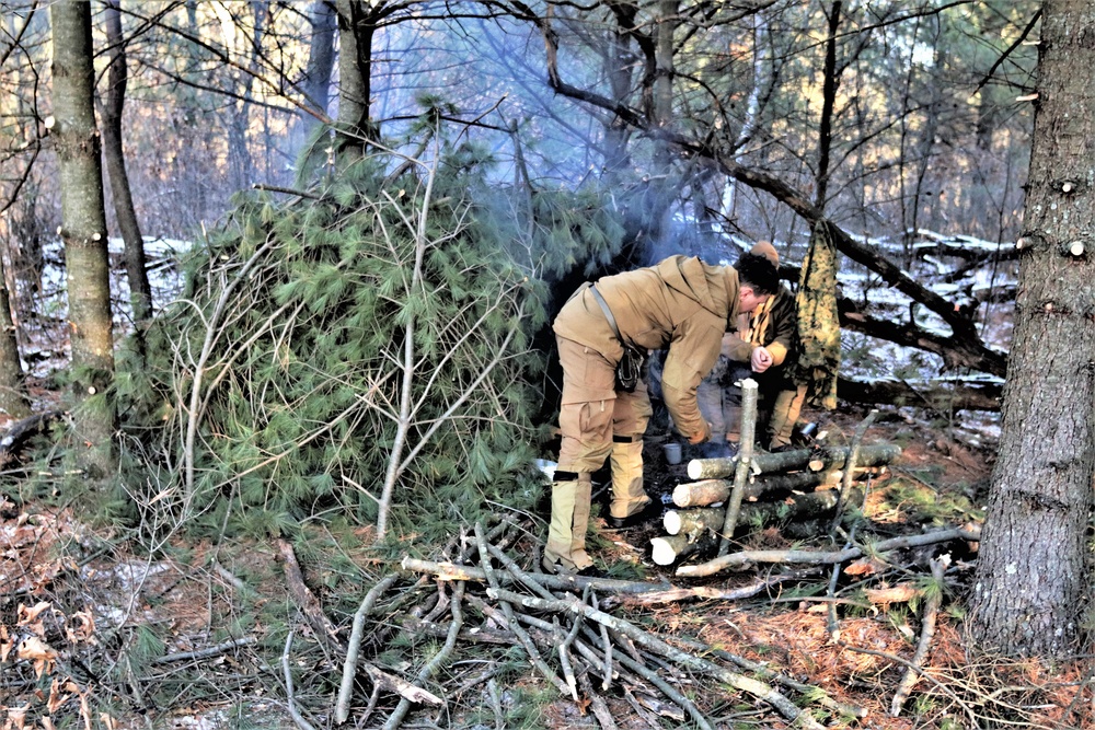 Improvised shelter building among important skills taught to Cold-Weather Operations Course Class 22-01 students