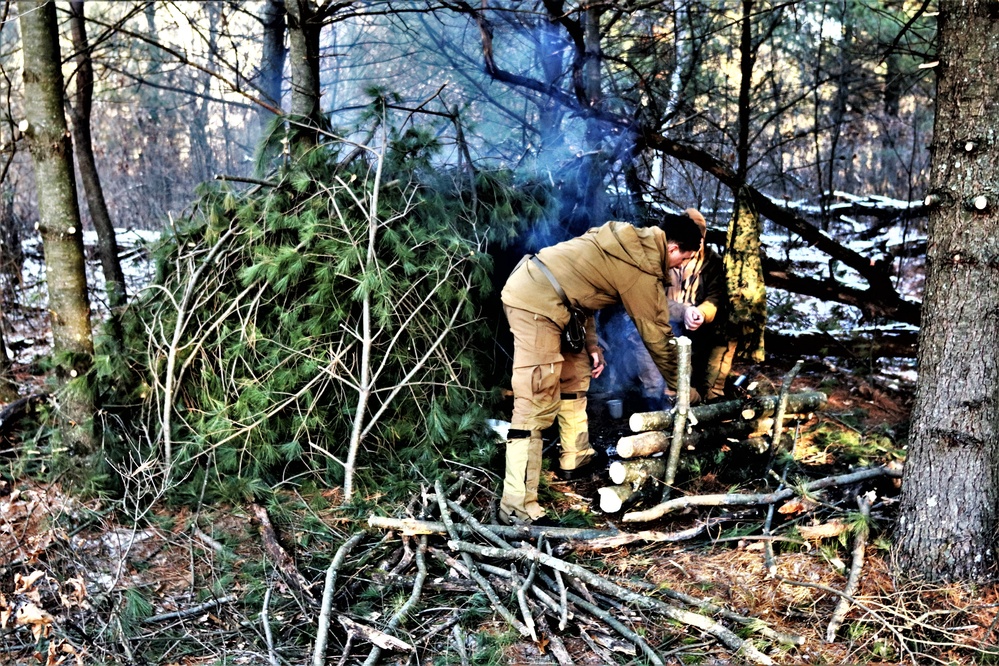 Improvised shelter building among important skills taught to Cold-Weather Operations Course Class 22-01 students