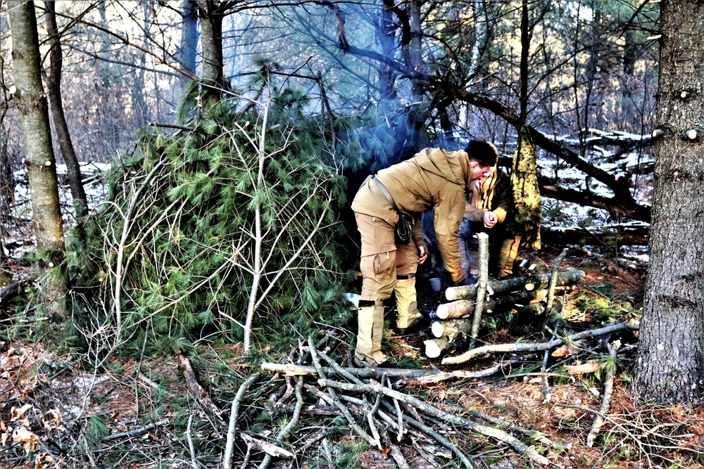 Improvised shelter building among important skills taught to Cold-Weather Operations Course Class 22-01 students