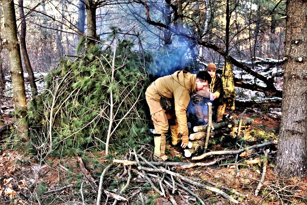 Improvised shelter building among important skills taught to Cold-Weather Operations Course Class 22-01 students