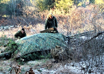 Photo Essay: Improvised shelter building skills taught to Cold-Weather Operations Course Class 22-01 students
