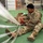 10th SFG riggers pack and inspect parachutes 10th SFG riggers pack and inspect parachutes