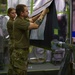 Structurally sound: Aircraft Maintenance Airmen apply a decal