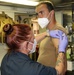 HSC 22 Sailor Receives a COVID-19 Booster Shot Aboard USS Milwaukee