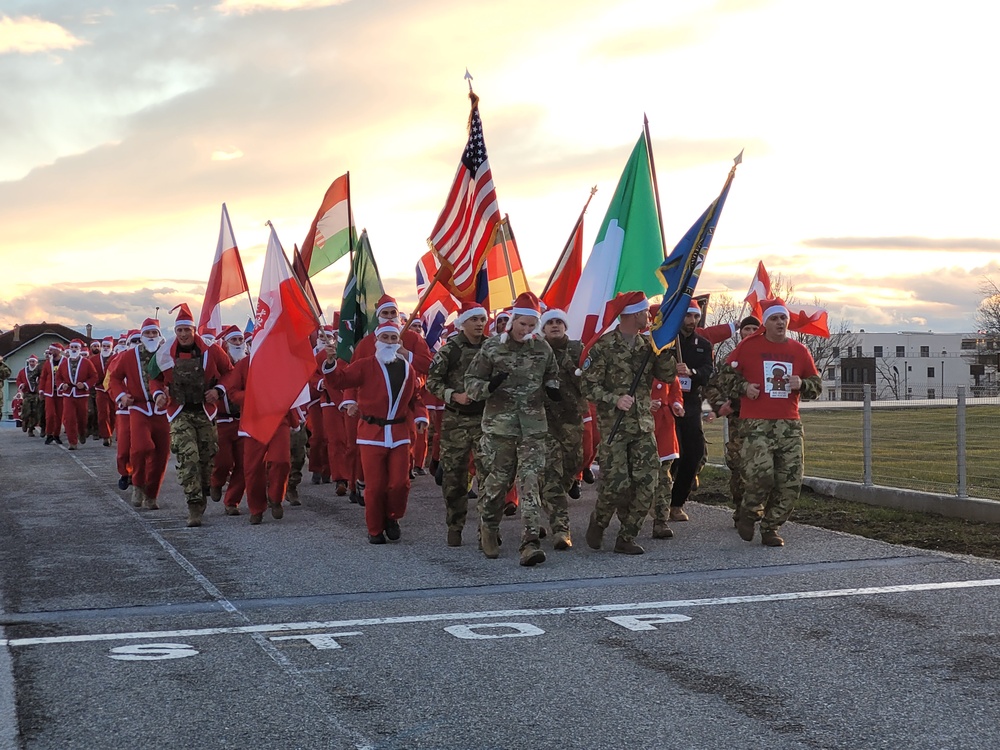 NATO soldiers participate in &quot;Run with Santa Claus&quot; for charity.