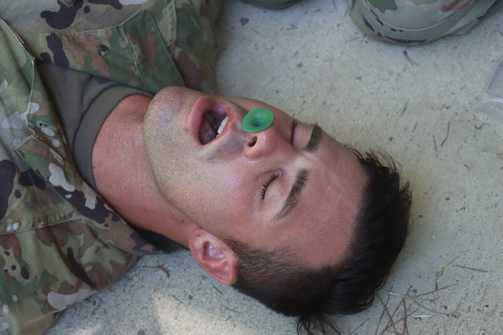 Army Motor Transport Operator volunteers to receive a Nasopharyngeal Airway during first aid training