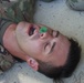 Army Motor Transport Operator volunteers to receive a Nasopharyngeal Airway during first aid training