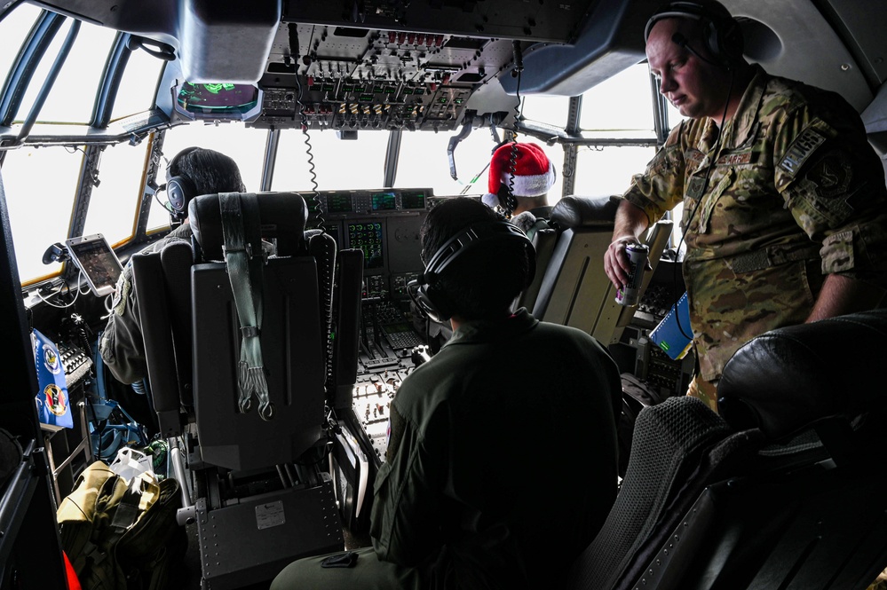 C-130s deliver presents for Operation Christmas Drop 70