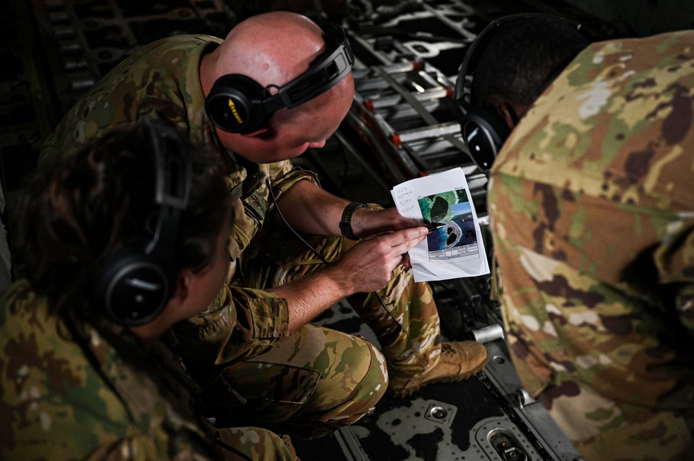 C-130s deliver presents for Operation Christmas Drop 70