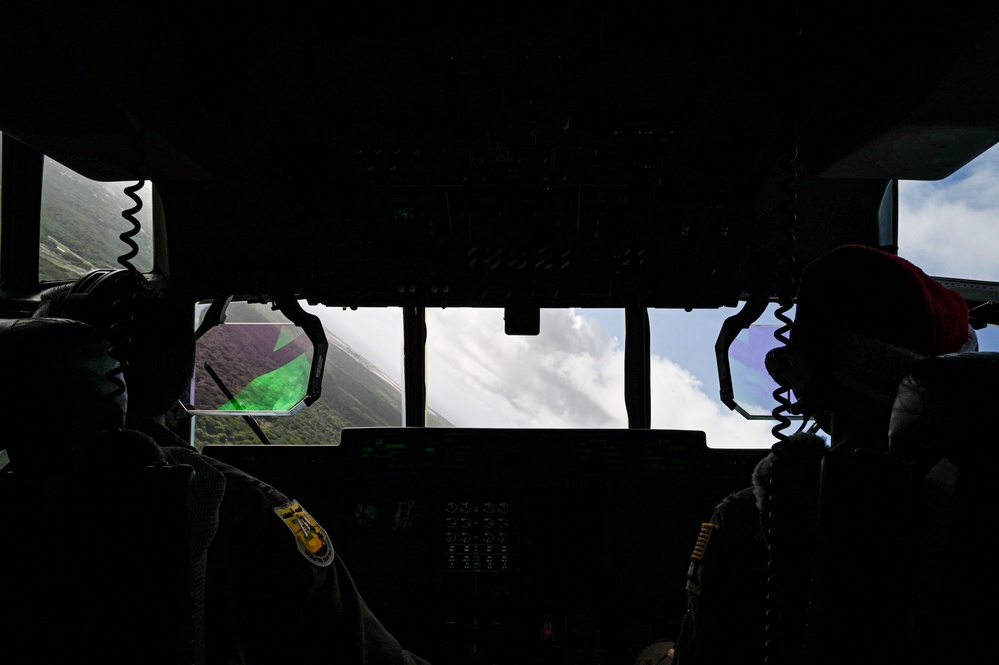 C-130s deliver presents for Operation Christmas Drop 70
