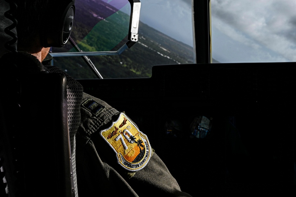 C-130s deliver presents for Operation Christmas Drop 70