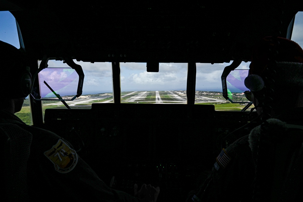 C-130s deliver presents for Operation Christmas Drop 70