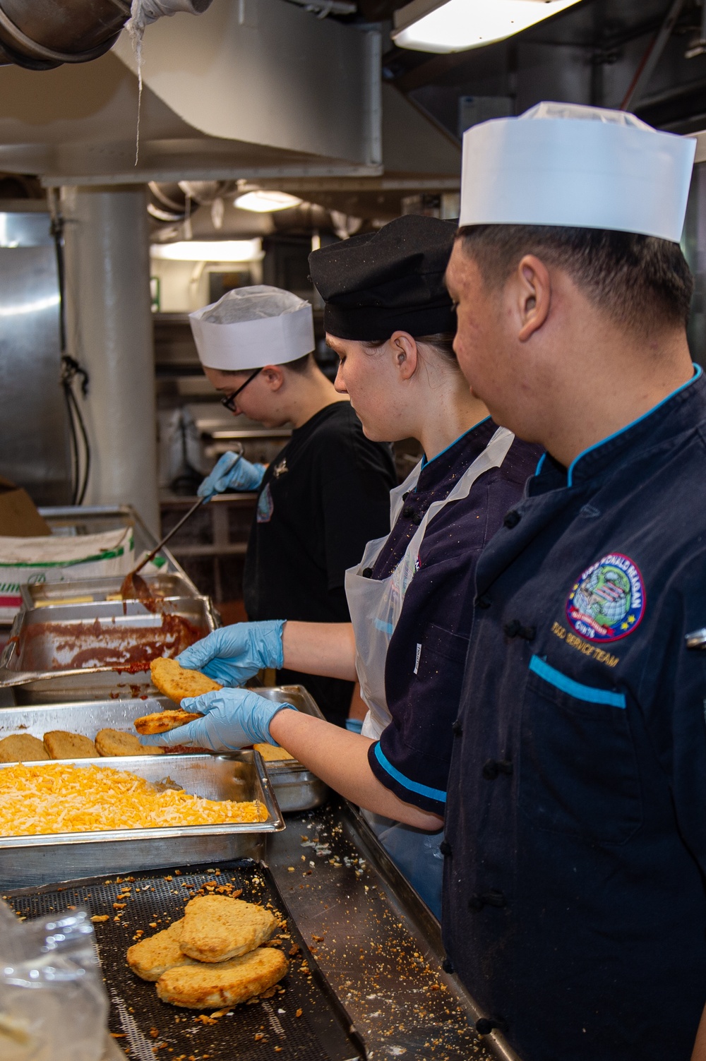 USS Ronald Reagan (CVN 76) Sailors Prepare Dinner