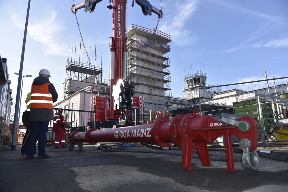 Preparing to lift the top of new Army air traffic control tower in Wiesbaden