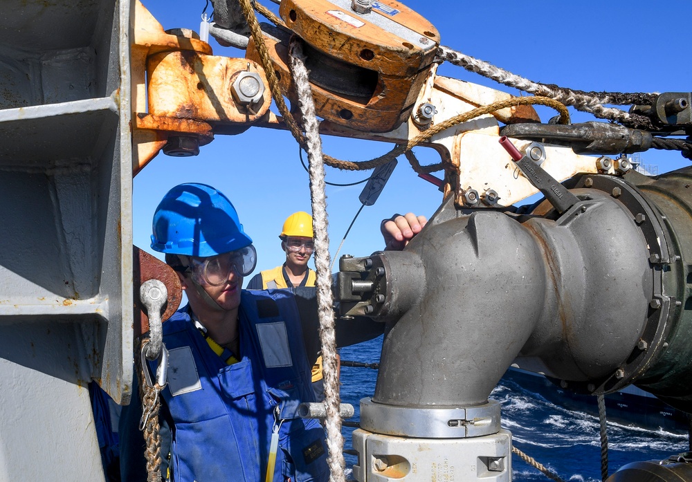 USS Chafee (DDG 90) Conducts A Replenishment-At-Sea In South China Sea