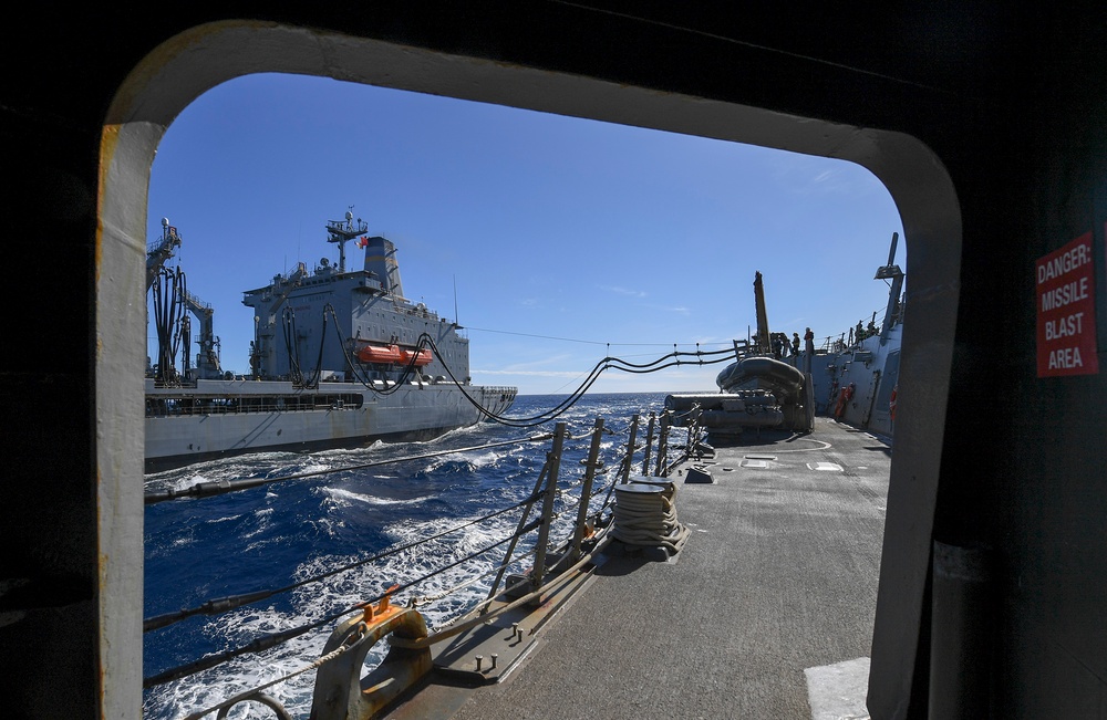 USS Chafee (DDG 90) Conducts A Replenishment-At-Sea In South China Sea