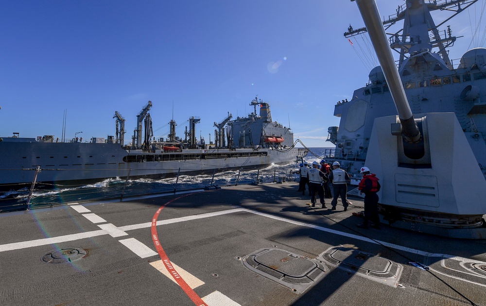 USS Chafee (DDG 90) Conducts A Replenishment-At-Sea In South China Sea