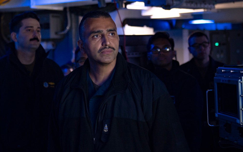 USS Carl Vinson (CVN 70) Sailor Conducts Brief During ANNUALEX 2021
