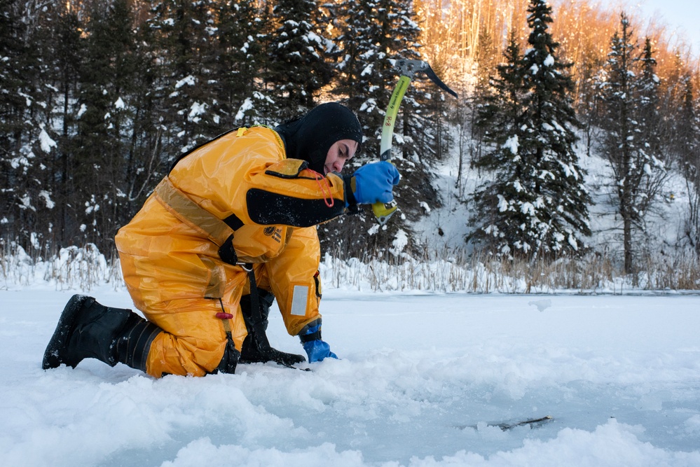 JBER fire protection specialists conduct ice rescue training