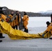 JBER fire protection specialists conduct ice rescue training