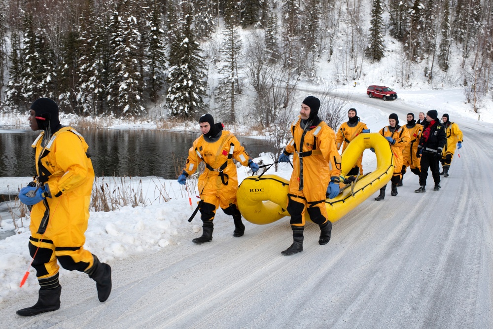 JBER fire protection specialists conduct ice rescue training