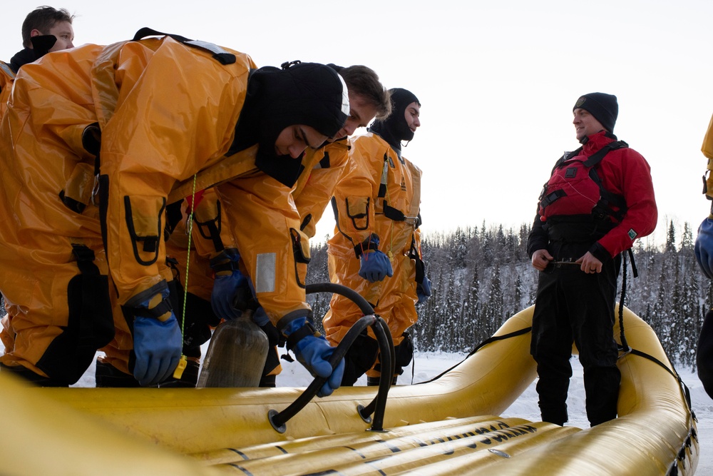 JBER fire protection specialists conduct ice rescue training