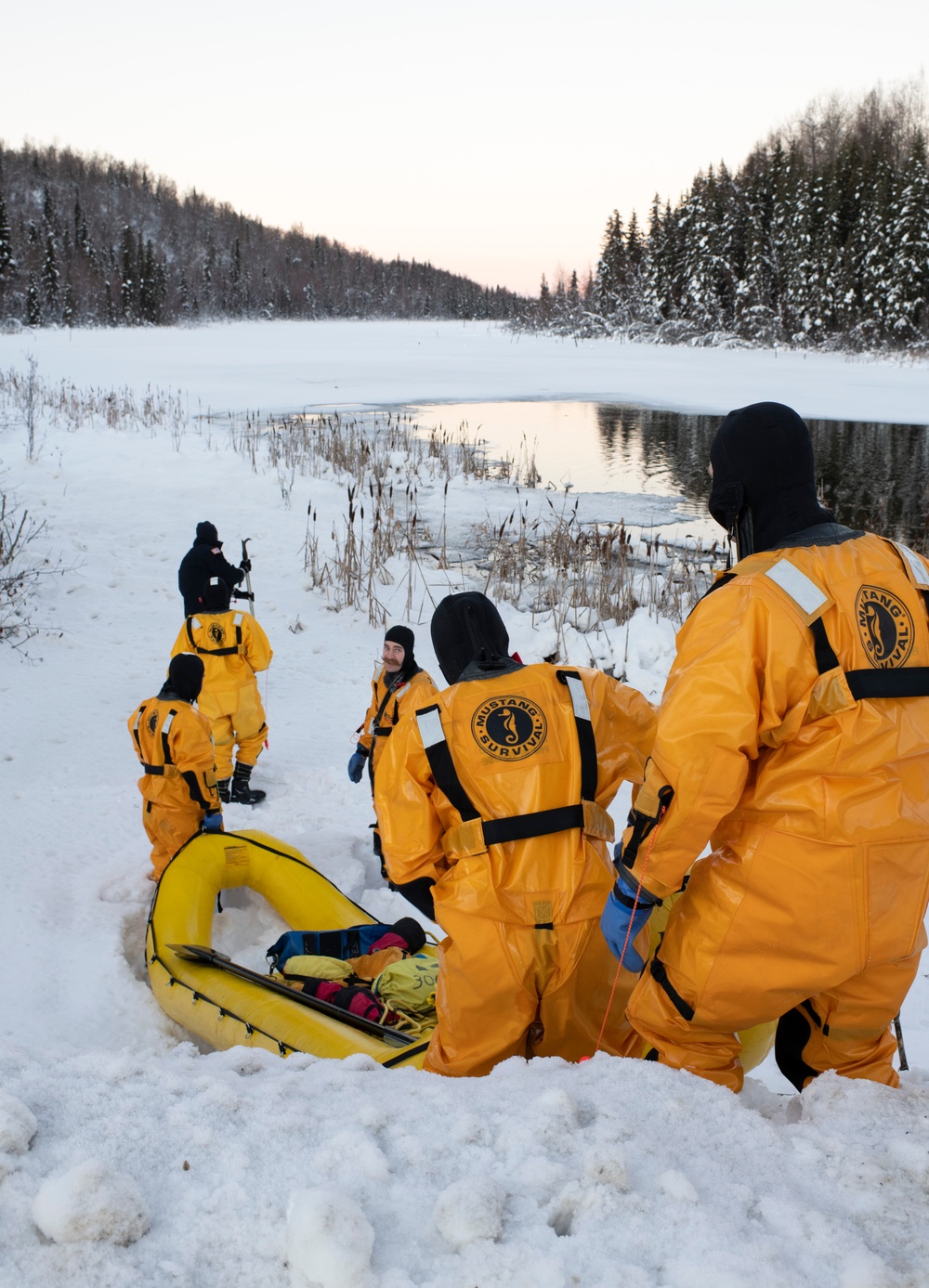 JBER fire protection specialists conduct ice rescue training