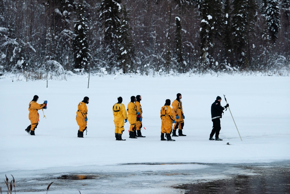 JBER fire protection specialists conduct ice rescue training