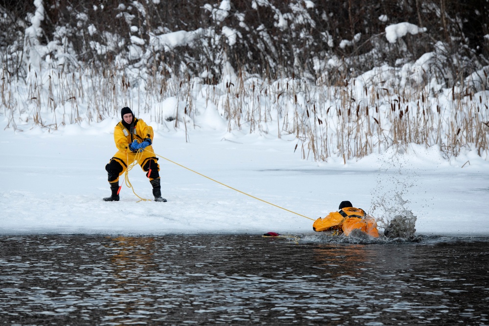 JBER fire protection specialists conduct ice rescue training