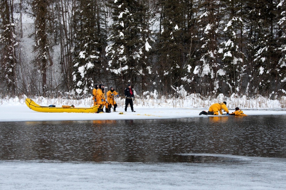 JBER fire protection specialists conduct ice rescue training