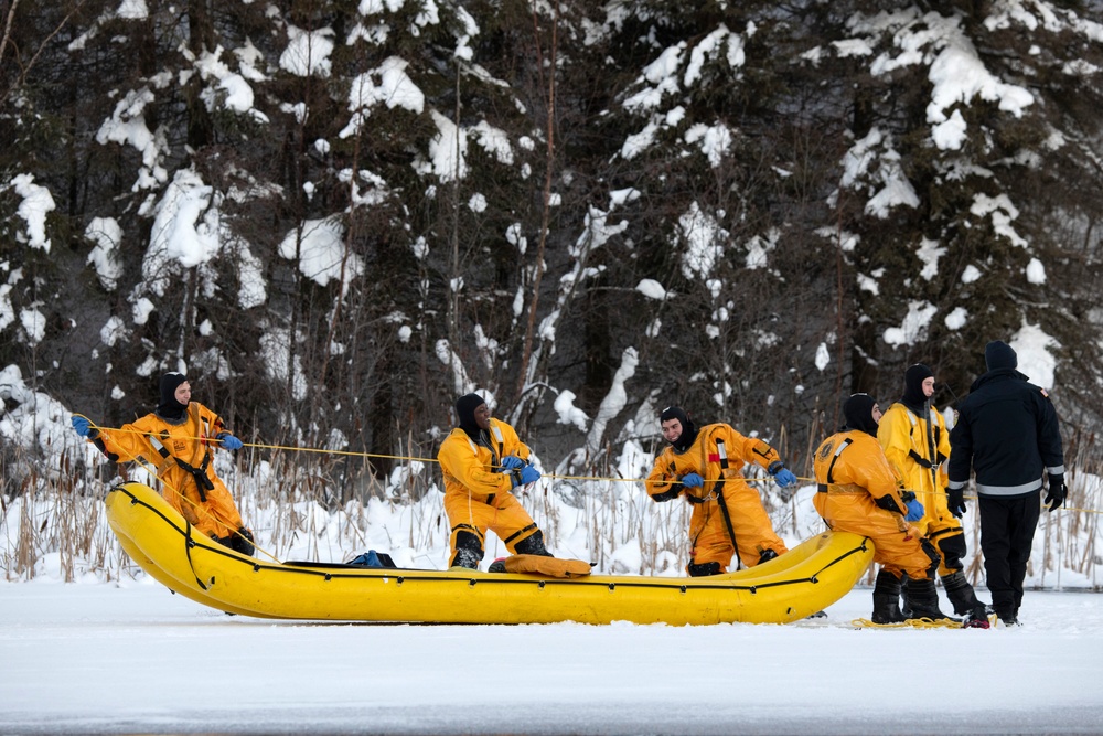 JBER fire protection specialists conduct ice rescue training